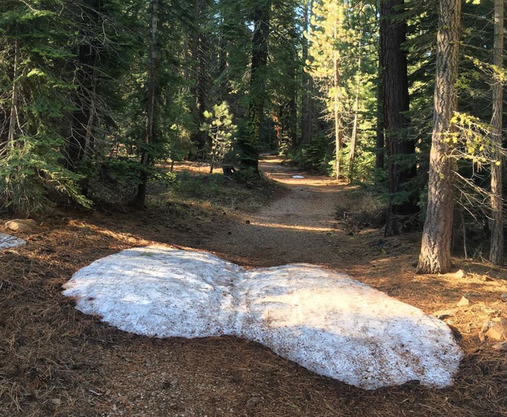 Snow Pile on Dirt Trail