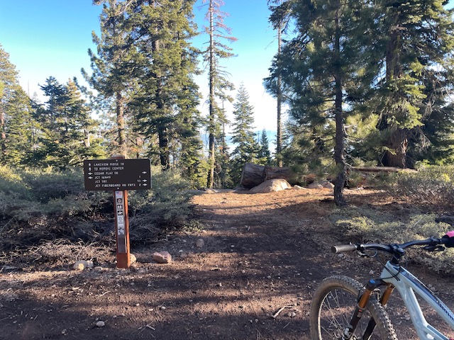 Trail Sign with Bike and Lakeview